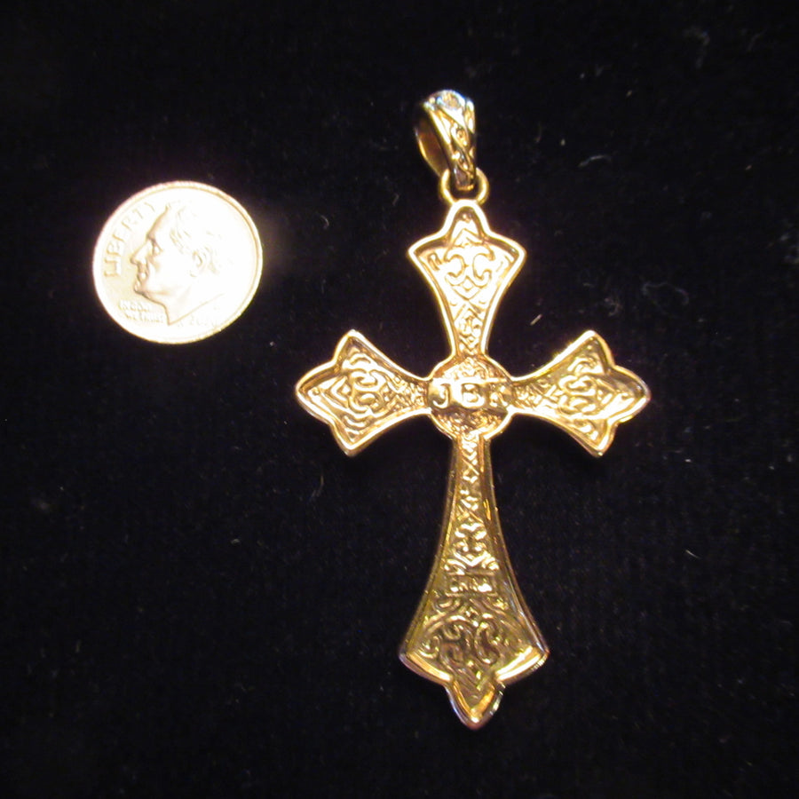 Gold toned Faceted Camrose & Kross Cross Bail pendant