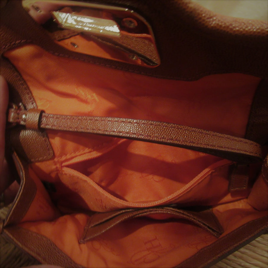 cole haan leather backpack british tan Cole Haan British tan Leather Clutch purse – Clotheshorse Consignment Boutique